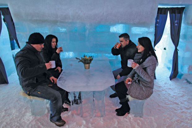 Tourists drinking, Balea Lac Hotel of Ice, Făgăraș Mountains
