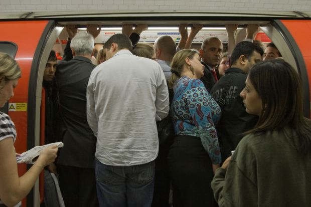 Packed tube train in London evening rush hour