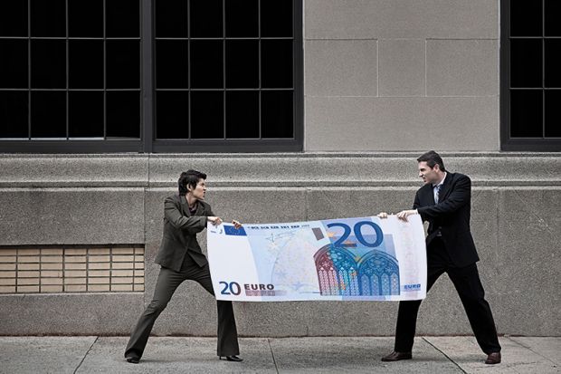 People fighting over giant Euro note