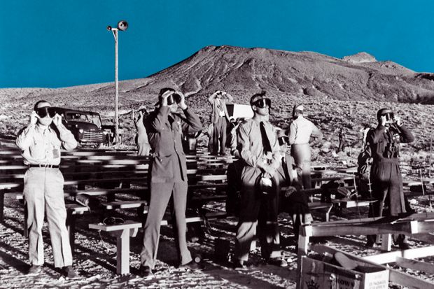 Canadian and British observers illumined by both the sun and an atomic blast of ABLE, a 1-kiloton atomic bomb. January 27, 1951 Canadian and British observers illumined by both the sun and an atomic blast of ABLE, a 1-kiloton atomic bomb. January 27, 1951