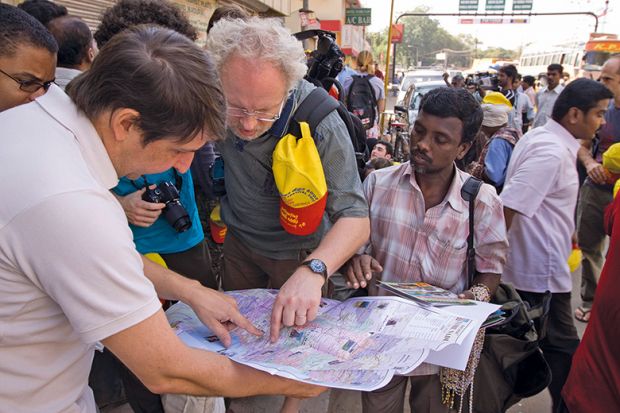 Tourists looking at a map