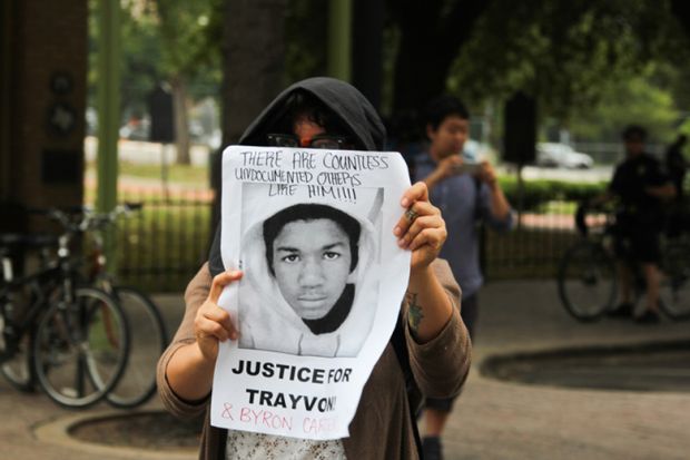 Woman Holds 'Justice for Trayvon' Poster in Austin, Texas Woman Holds 'Justice for Trayvon' Poster in Austin, Texas