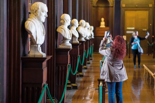 Male busts in Long Room of the Old Library, Trinity College, Dublin