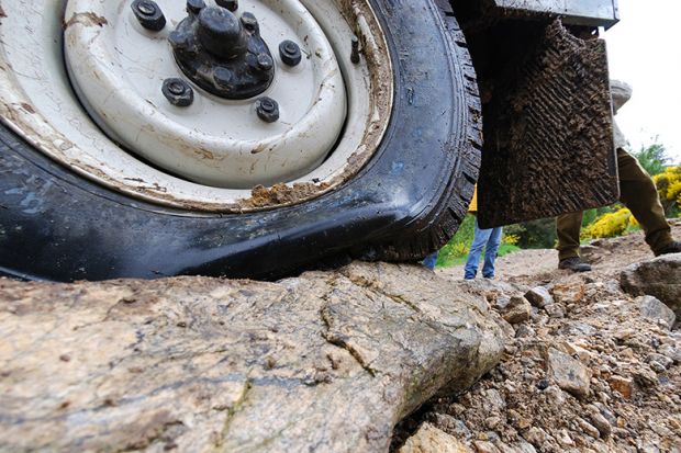 Truck tyre damaged by bumpy road