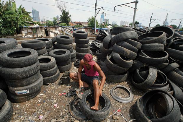 Man with tyres