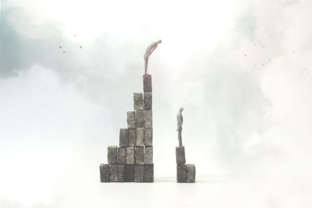 A man on a tall pile of bricks looks down on one on a smaller pile