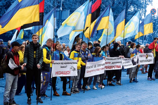 Students and teachers of Ivan Poddubny Olympic College protest about merge of the academic institution and the National University of Physical Education and Sport outside the Cabinet of Ministers building, Kyiv, 2020