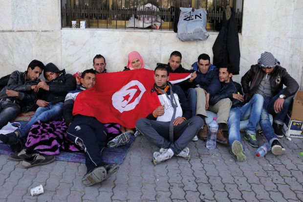 Unemployed people outside Tunisian Ministry of Vocational Training and Employment