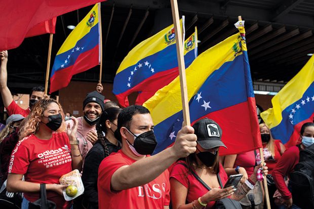 Supporters of Nicolas Maduro participate in a rally on Youth Day 