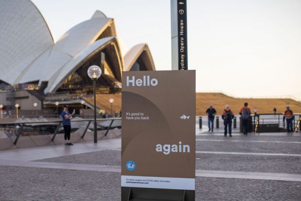 A sign welcomes people back outside the Sydney Opera House  in Sydney, Australia to illustrate ‘Give people time’ to readjust from pandemic, says Jackson