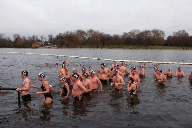 Members of the Serpentine Swimming club exit the water together Members of the Serpentine Swimming club exit the water together to illustrate ‘Urgent review’ of TPS needed as more universities seek exit