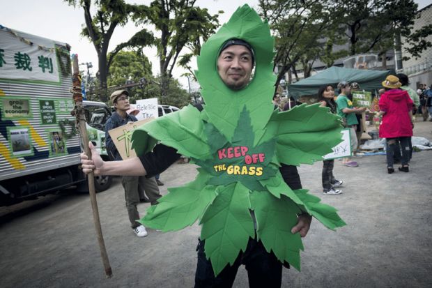 People participated in the march calling for the legalization of marijuana in Tokyo to illustrate Marijuana scandals test Japanese university leaders