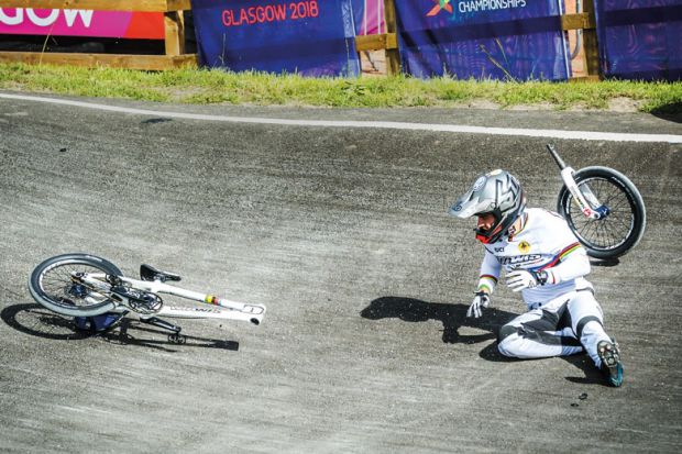 Sylvain Andre (France) fallen off his BMX bike to illustrate Domestic students edged out as UKRI trims PhD support