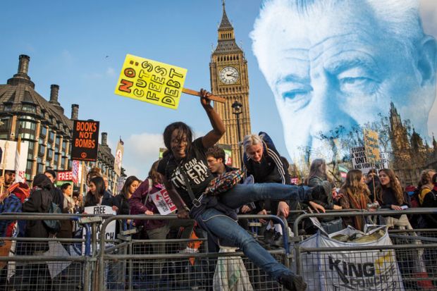 Montage of potestors jumping over the barriers surrounding Parliament Square during a march against student university fees with Lord Robbins portrait in the background to illustrate Do we need another Robbins report? Only if  it faces up to finance