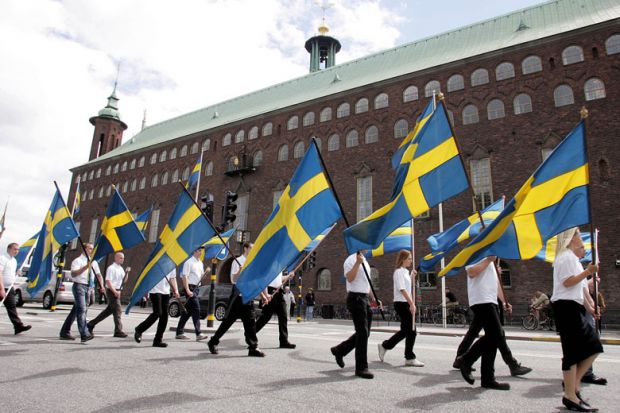 Extreme-right nationalists march in front of the Stockholm City Hall to illustrate Sweden split on how to handle right-wing student’s ‘harassment’
