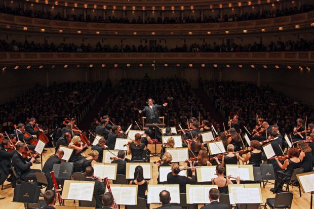 Belgrade Philharmonic Orchestra performing at Carnegie Hall to illustrate Amplifying the ensemble