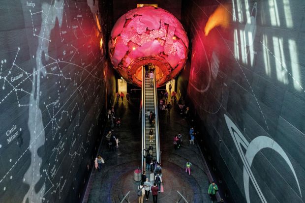 The Earth Galleries at the National History Museum, London showing escalator travelling into the Earth to show English HE bill anticipated with focus on lifelong loans
