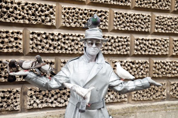 Metallic painted human statue to illustrate ‘Record’ number of UK universities put pay rises on hold