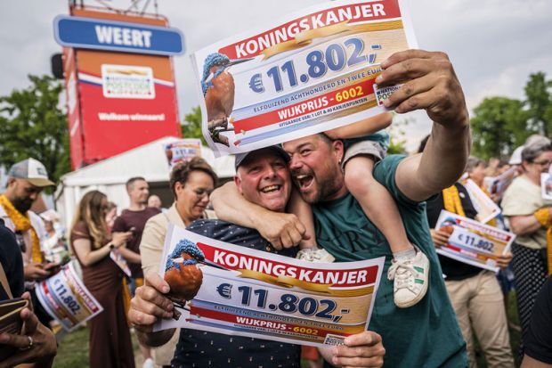 Winners during a traditional neighbourhood party organised by the Postcode Lottery to illustrate Open science ‘has turned Dutch research funding into lottery’