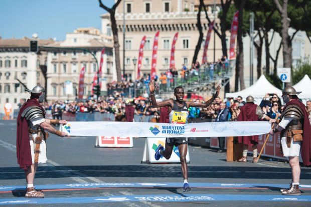 Amos Kipruto crossing the finish line in Rome to illustrateItaly’s lettori divided on  £36 million plan to end epic dispute