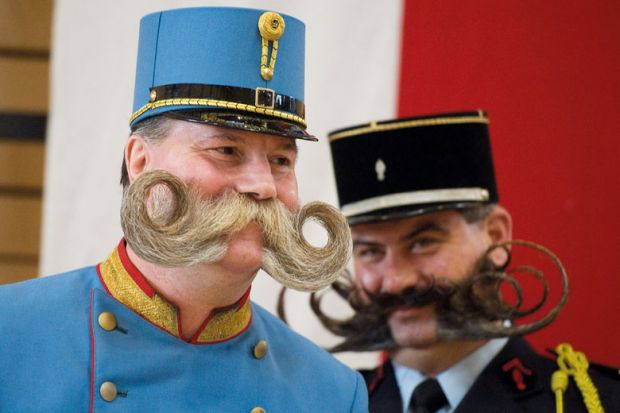 Two contestants pose during the  European Beard and Moustache Championships to illustrate  Reforms urged to curb French ‘moustache positions’