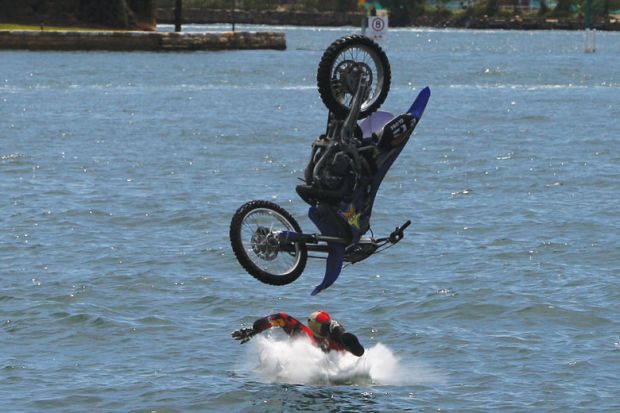 Man falls into the water on his bike as a metaphor for No sector experience needed to sit on Australia’s university councils