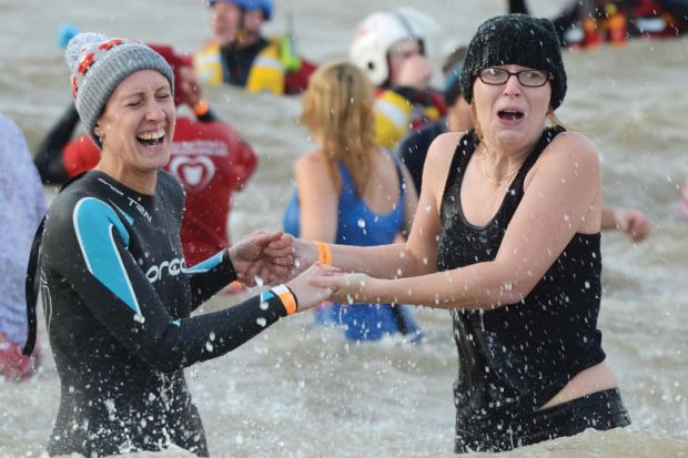  Swimmers braved the icy cold waters of the Thames Estuary to illustrate administrative purge leaves UK universities exposed