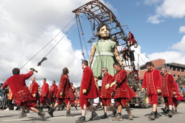 Giant puppet being walked throughout Liverpool, England to illustrate DSIT creation brings fear over ‘political direction’ of research