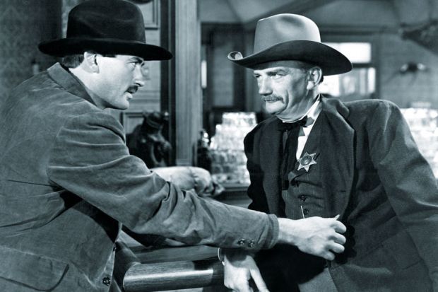 The Gunfighter, Gregory Peck, Millard Mitchell, 1950 showing sheriff badge to illustrate 'Accreditors in firing line as US political temperature rises'