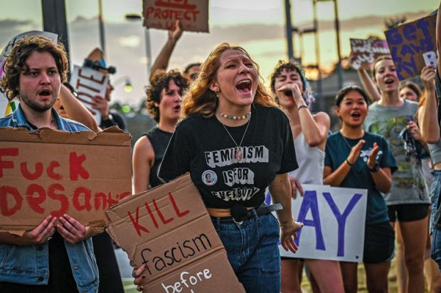 LGBTQ rights supporters protest in Fort Myers, Florida to illustrate 'US states restricting LGBTQ rights face exodus of students'