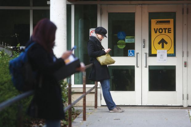  'Vote' signs outside a polling station in the University-Rosedale riding of Toronto as Canadians protest as on-campus voting axed for snap election