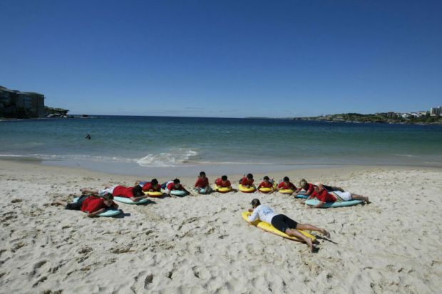Students taking part in a surf awareness course in Australia at Bondi Beach to illustrate Supervisor’s support ‘crucial’ to novice academics’ well-being