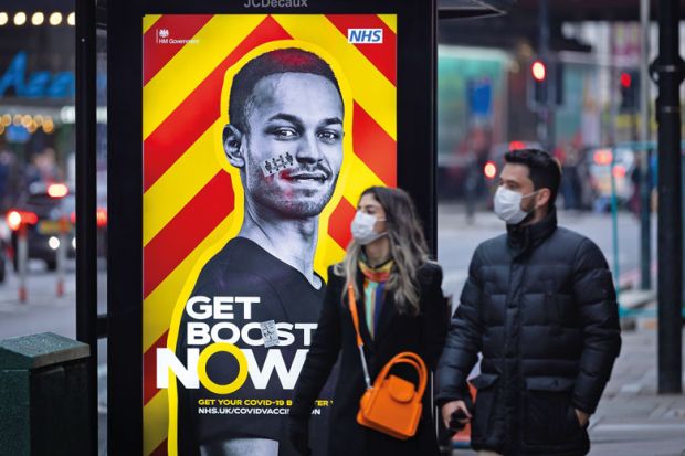 Government advertisement poster promoting the Covid-19 booster vaccine seen at a bus shelter in London to illustrate ‘Major outbreaks’ of Omicron likely on UK campuses, warn experts
