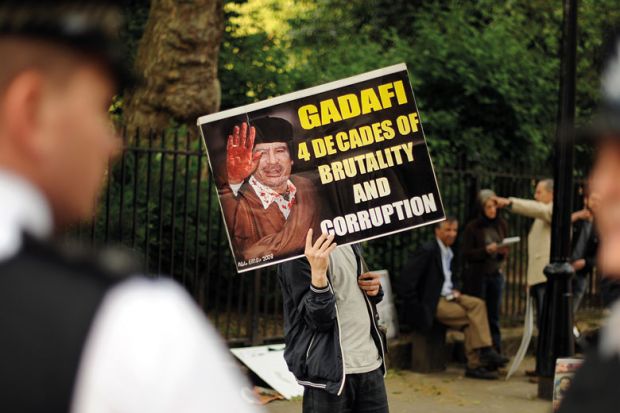 Protesters opposed to Libyan leader Moamer Kadhafi demonstrate outside of the London School of Economics to illustrate English sector ‘won’t be open on foreign donations unless forced’