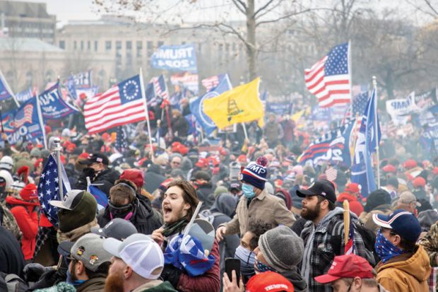 Washington, USA, 06 January 2021. Supporters of President Donald J. Trump breach Capitol Hill during the certification of the electoral college's vote.