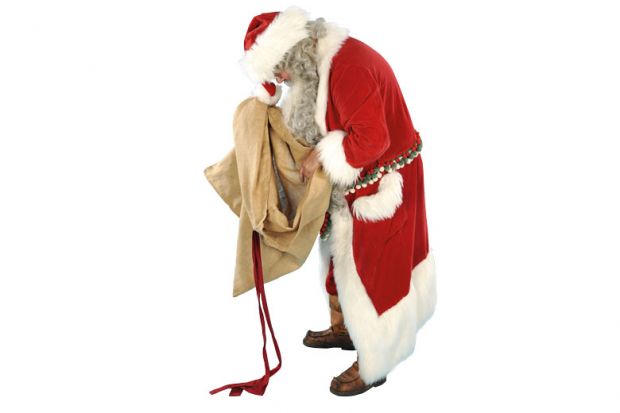 Father Christmas looking in an empty sack to illustrate lack of funding