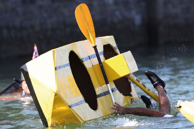 Person falls overboard during the Cardboard Boat Regatta to illustrate REF 2029: loose Hesa rules ‘risk return of game-playing’