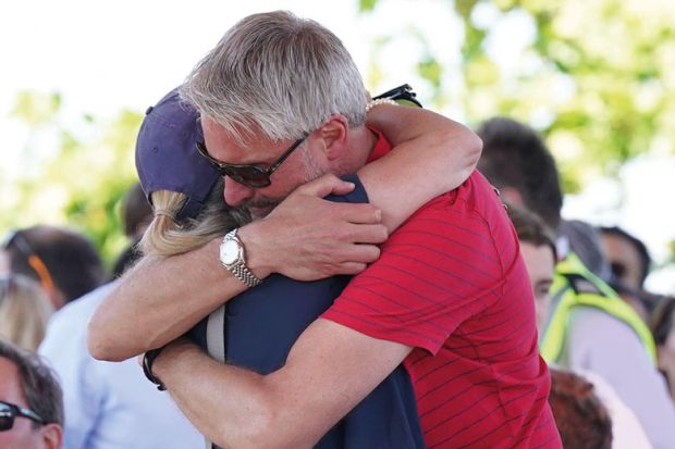 Barnaby Webber's father David embraces Grace O'Malley Kumar's mother ahead of a vigil at the University of Nottingham Barnaby Webber's father David embraces Grace O'Malley Kumar's mother ahead of a vigil at the University of Nottingham as the article describes