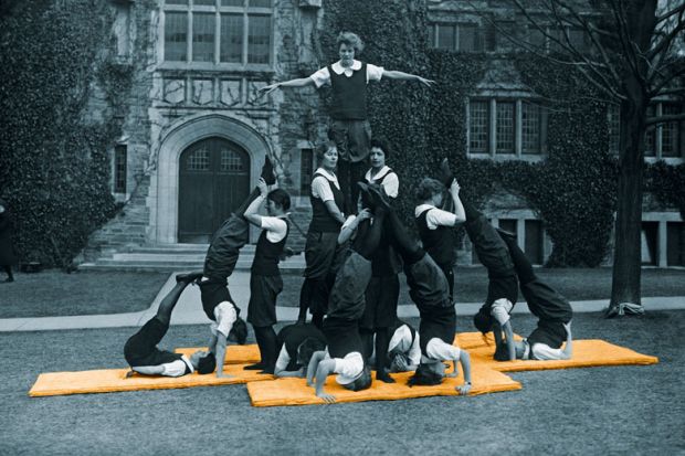 Team of lady acrobats practise on a lawn to illustrate Irish universities’ gender rebalance may not persist