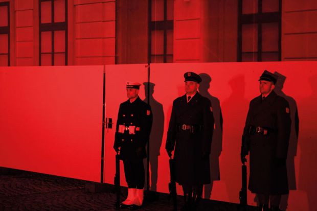 Polish soldiers guard the entrance of the Presidential Palace to illustrate Polish president stifles genocide researcher’s professorship bid