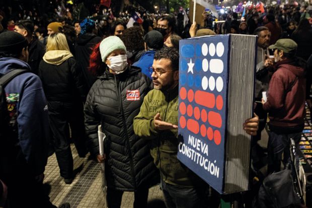 Thousands of people take part in a closing rally for the "I approve" option to change the constitution in Santiago, Chile to illustrate Chile’s constitutional impasse frustrates HE reform