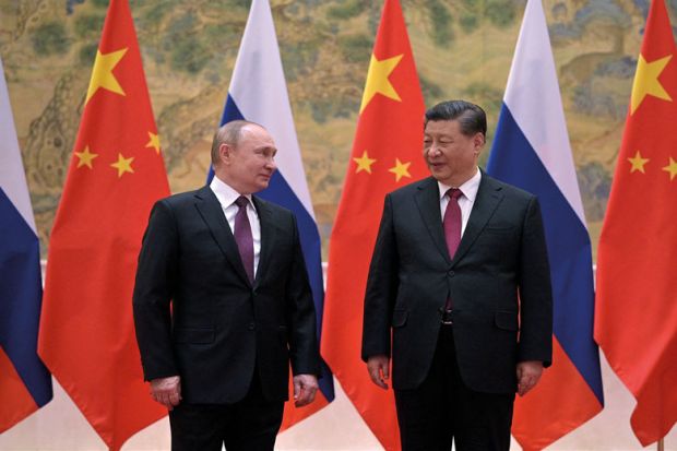 Russian President Vladimir Putin attends a meeting with Chinese President Xi Jinping in Beijing to illustrate When blocs crystallise