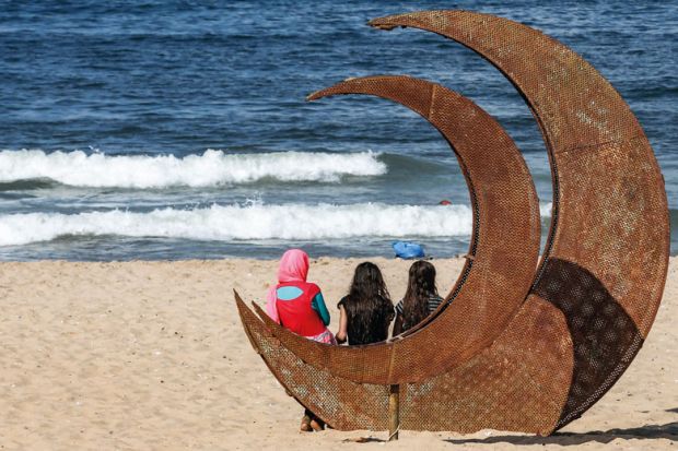 Syrian refugees visit a public beach in the Lebanese capital Syrian refugees visit a public beach in the Lebanese capital to illustrate New SOAS institute moves Middle Eastern studies beyond conflict