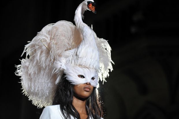 Woman wearing swan headdress