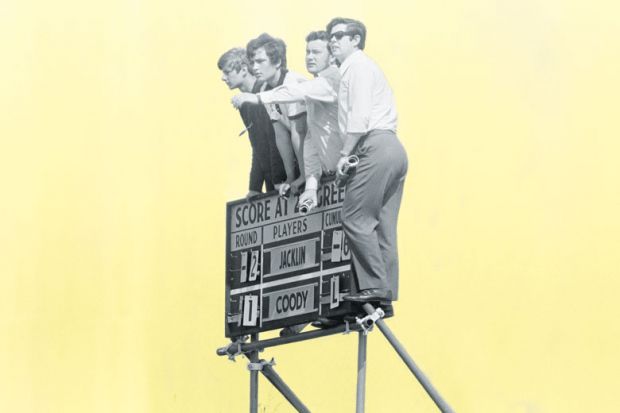 Four students on scoreboard