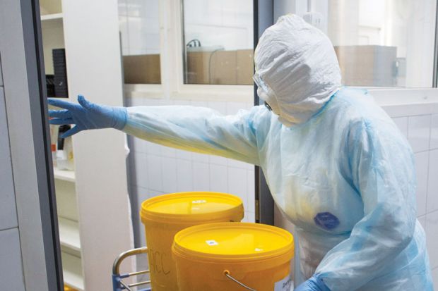 Health worker wearing personal protective equipment