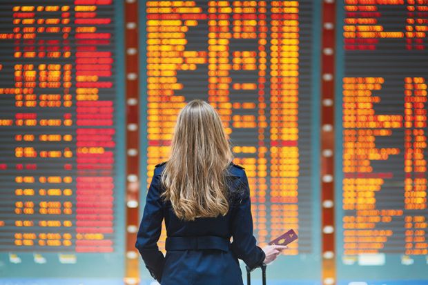 woman at departures board