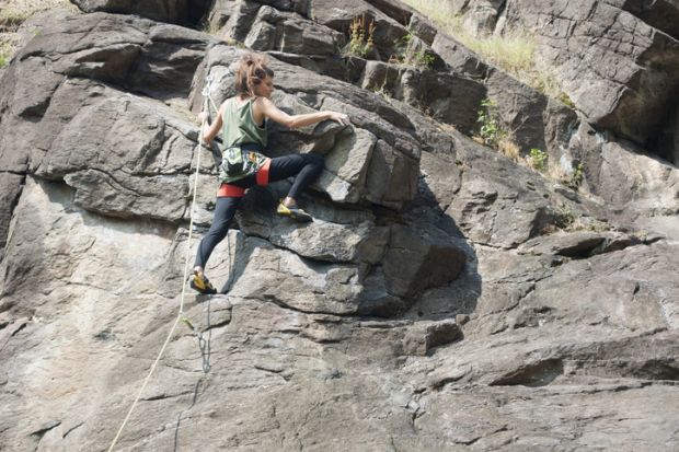 Woman climbing in Quincinetto