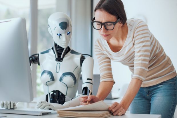 A woman and a robot work together