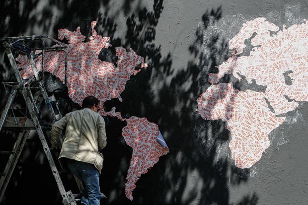 World map made from 'fragile' stickers